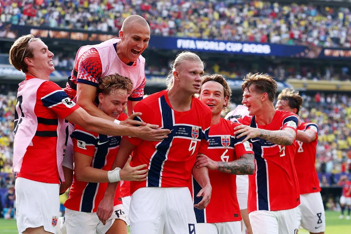 Soccer Football - FIFA World Cup 2026 - Round of 16 - Brazil v Norway - New York New Jersey Stadium, East Rutherford, New Jersey, U.S. - July 5, 2026 Norway's Erling Haaland celebrates scoring their second goal with teammates IMAGN IMAGES via Reuters/Vincent Carchietta