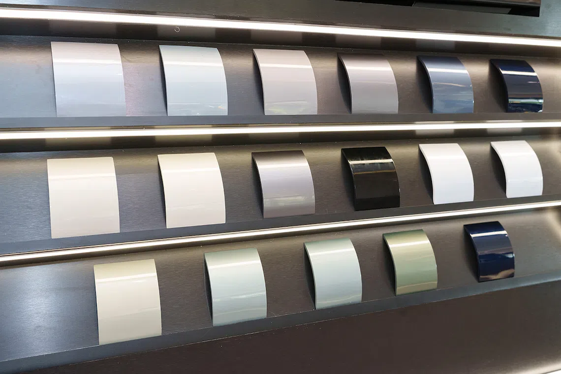 Visitors can browse a selection of exterior paint finishes while exploring BYD's latest models.