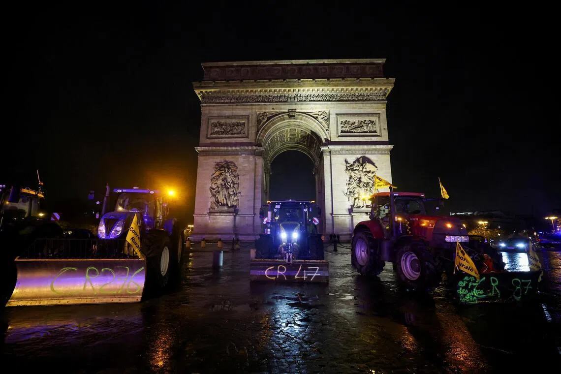Dozens of tractors were parked on the Seine bank below the Eiffel Tower and blockading some accesses to the city centre.  