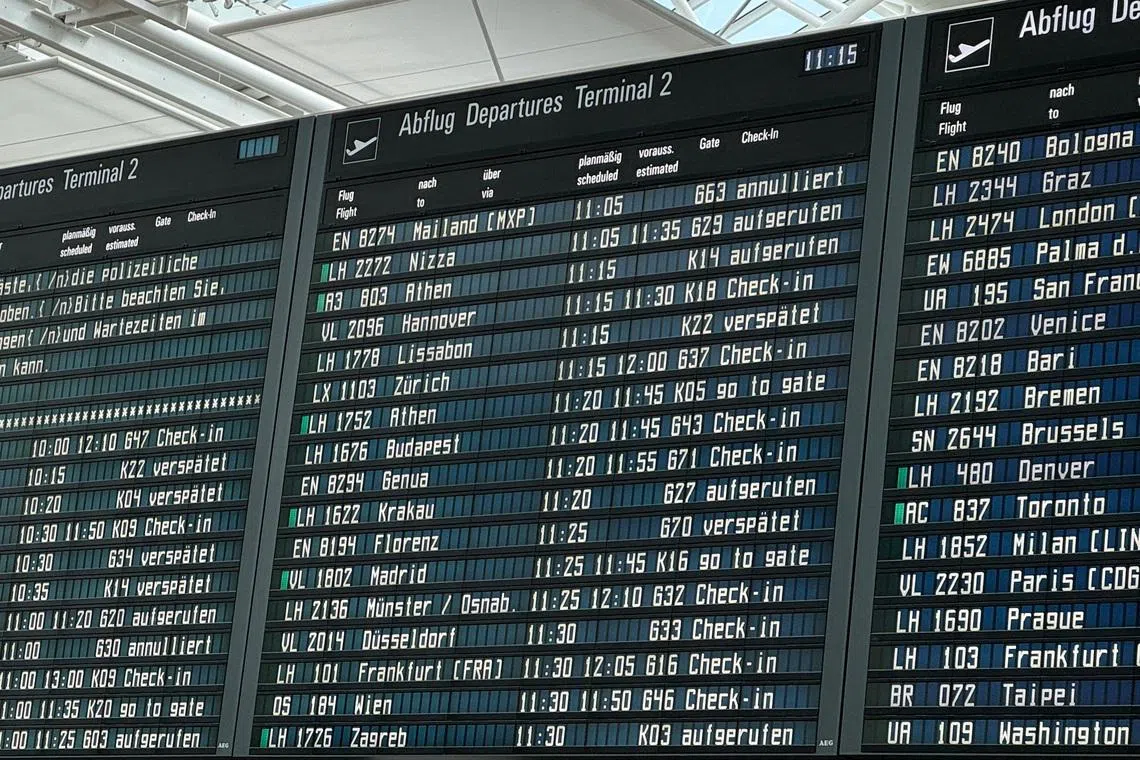 An information board showing cancelled and delayed flights at Munich Airport after a possible drone sighting on May 30.