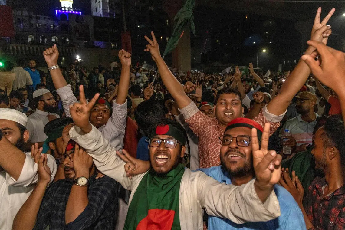 People celebrate after the interim government officially banned all the activities of the Bangladesh Awami League, until the trial of the party and its leader, following the demand of the protesters, in Dhaka, Bangladesh, May 10, 2025. REUTERS/Abdul Goni/File Photo