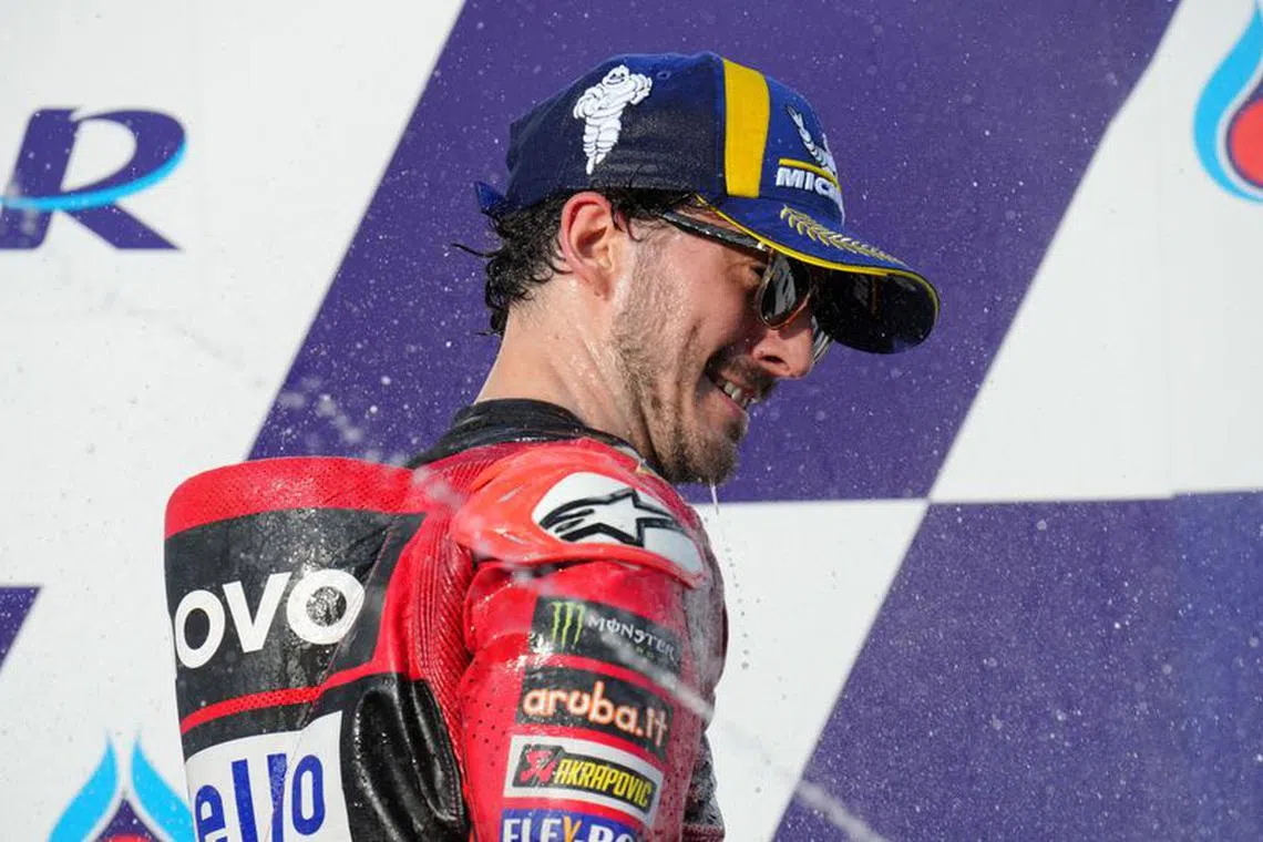 MotoGP - Thailand Grand Prix - Chang International Circuit, Buriram, Thailand - October 29, 2023 Ducati Lenovo Team's Francesco Bagnaia celebrates on the podium after finishing second in the MotoGP REUTERS/Athit Perawonmetha/File Photo
