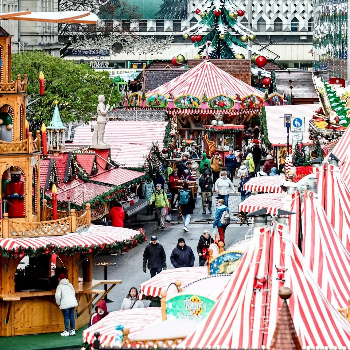 People visiting the Christmas Market in Magdeburg, Germany, on Nov 20.
