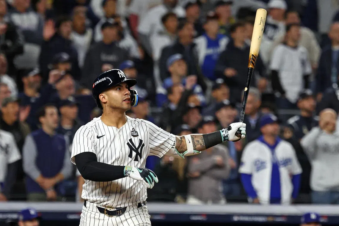FILE PHOTO: Oct 29, 2024; Bronx, New York, USA;  New York Yankees second baseman Gleyber Torres (25) reacts after hitting a three run home run against the Los Angeles Dodgers in the eighth inning during game four of the 2024 MLB World Series at Yankee Stadium. Mandatory Credit: Vincent Carchietta-Imagn Images/File photo