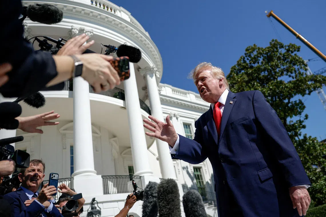 FILE PHOTO: US President Donald Trump speaks to reporters before boarding Marine One as he departs for Denton, Texas, on the South Lawn of the White House in Washington, D.C., US, October 1, 2026. REUTERS/Evan Vucci/File Photo