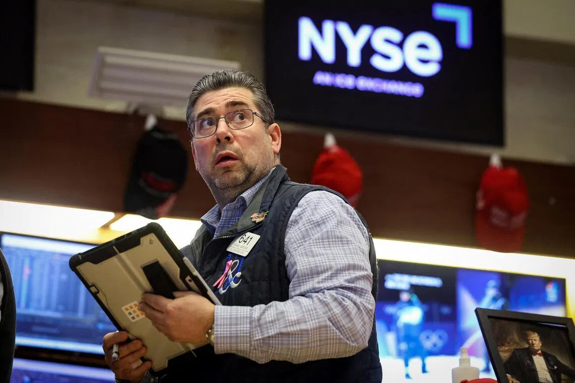 A trader working on the floor of the New York Stock Exchange, in New York City, on Feb 5.