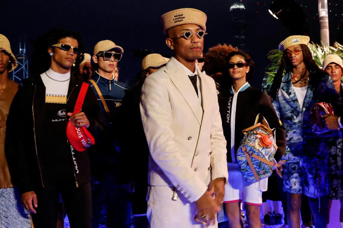 Musician Pharrell Williams appears at the end of his first Men's Pre-Fall Show at Louis Vuitton's first Men's Pre-Fall 2024 Show in Hong Kong on Nov 30, 2023. 