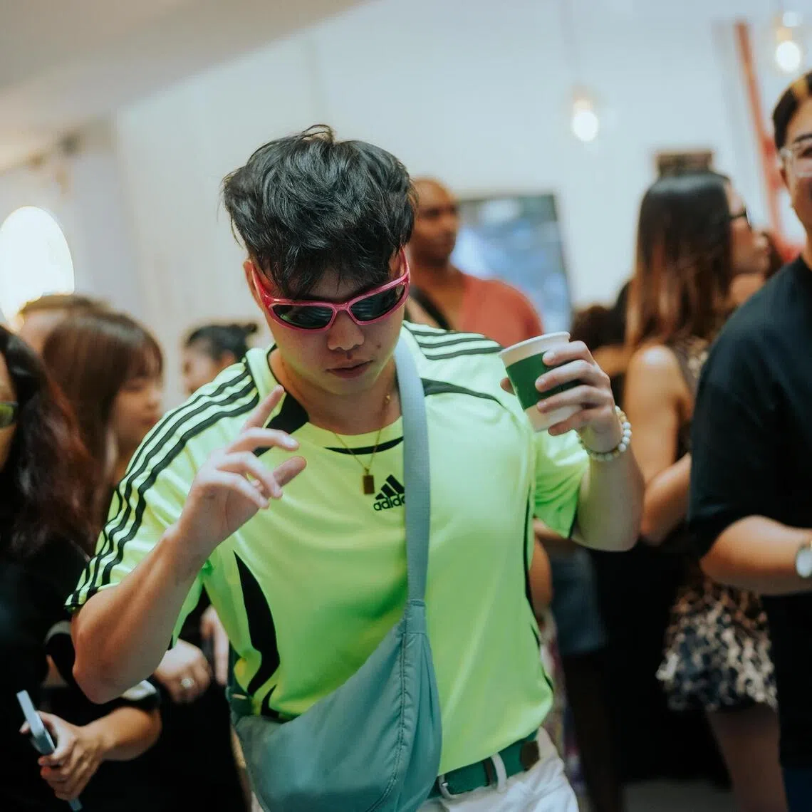 mcsober - Attendees enjoying the music and non alcohol drinks at Kate Spade New York x Beans&Beats party at Echo House @ KADA. 

Credit: Beans&Beats