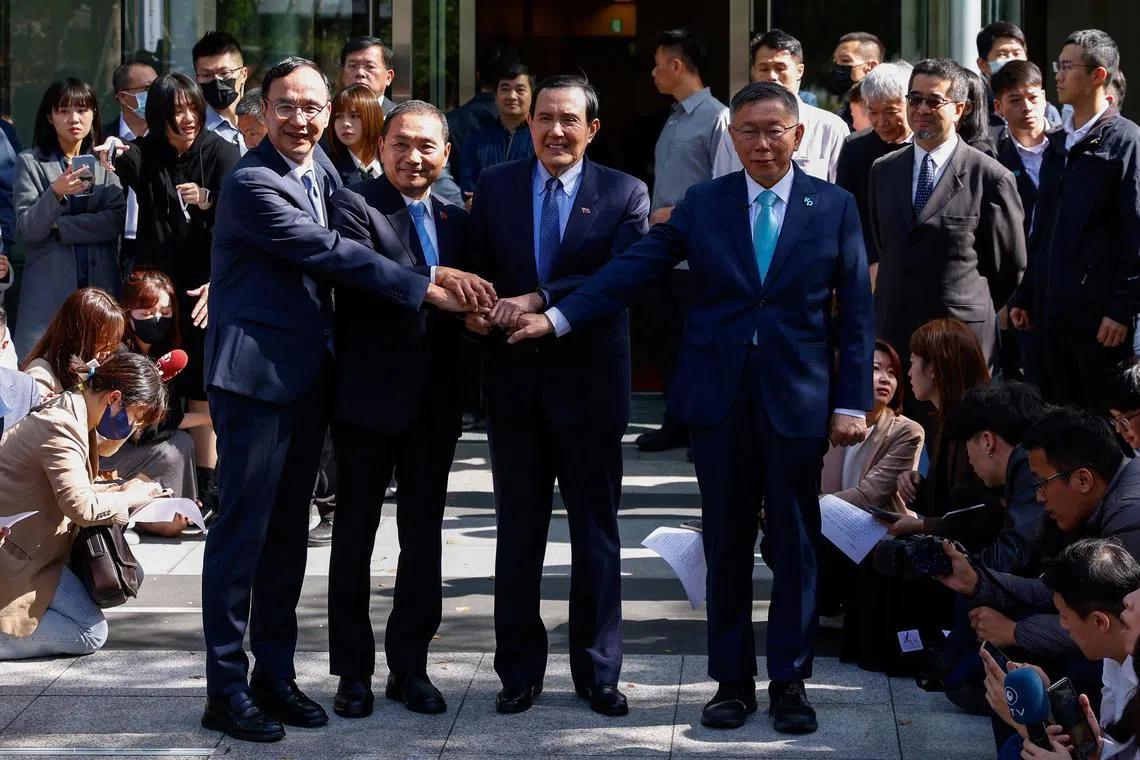 (From left) Kuomintang chairman Eric Chu and presidential candidate Hou Yu-ih, former Taiwan president Ma Ying-jeou and Taiwan People's Party presidential candidate Ko Wen-je.