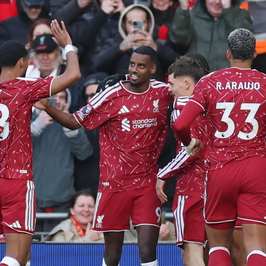 Alexander Isak (centre) celebrates scoring Liverpool’s 2-0 goal against Brighton & Hove Albion, in Liverpool, Britain, on Oct 25.