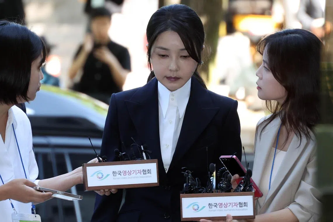 South Korea's former first lady, Kim Keon Hee (centre), arriving for her hearing on Aug 12 at Seoul's Central District Court.