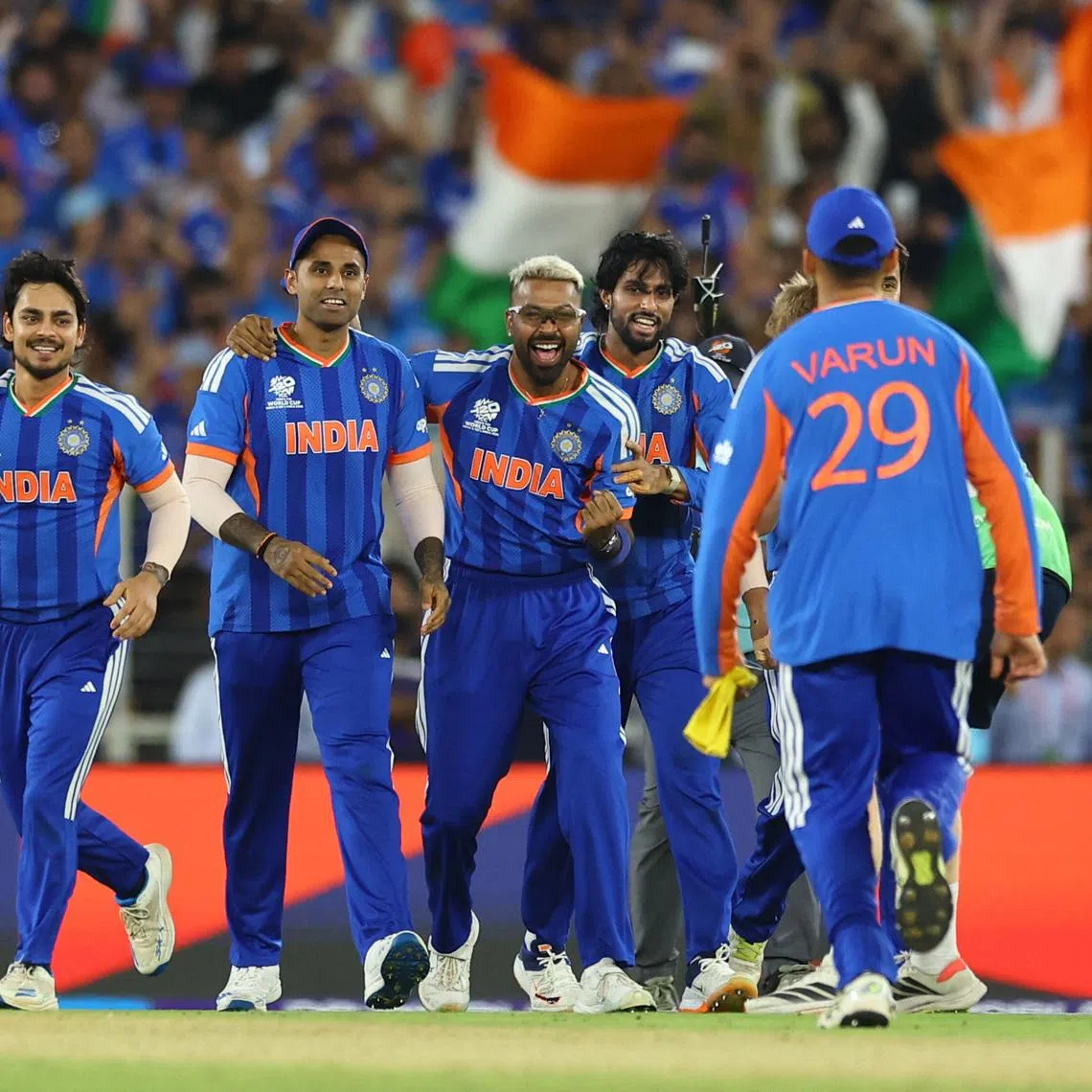 Cricket - ICC Men's T20 World Cup 2026 - Final - India v New Zealand - Narendra Modi Stadium, Ahmedabad, India - March 8, 2026 India's Hardik Pandya celebrates with teammates after winning the ICC Men's T20 World Cup. REUTERS/Anushree Fadnavis