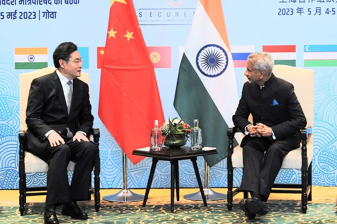 Chinese Foreign Minister Qin Gang (left) with his Indian counterpart S Jaishankar during a meeting in India. 