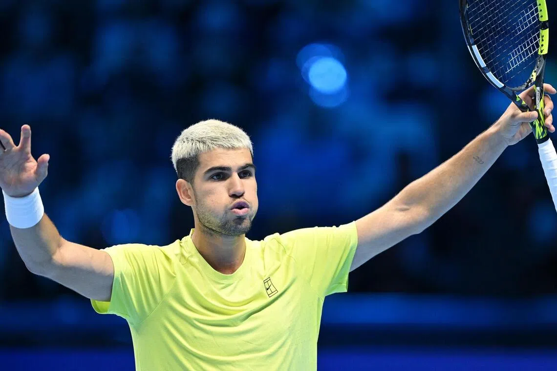 Carlos Alcaraz celebrating his win over Taylor Fritz at the ATP Finals on Nov 11.