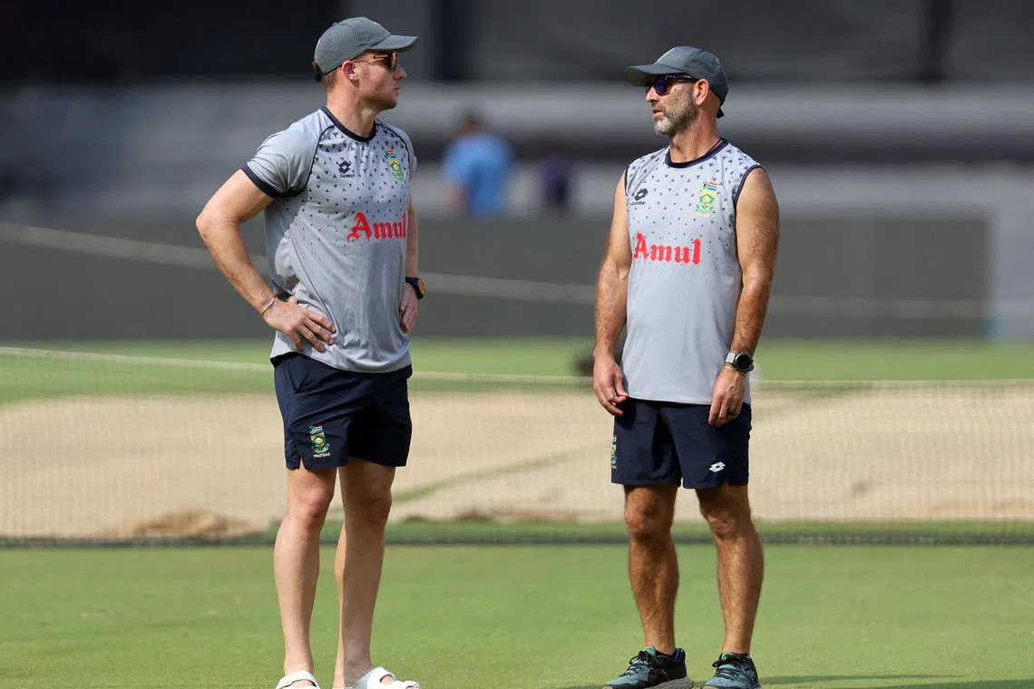 Cricket - ICC Cricket World Cup 2023 - South Africa Practice - Narendra Modi Stadium, Ahmedabad, India - November 9, 2023 South Africa head coach Rob Walter and David Miller during practice REUTERS/Amit Dave