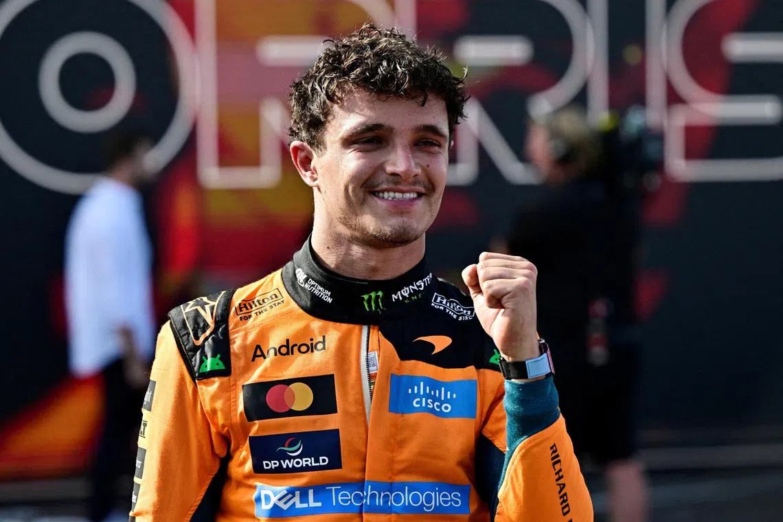 McLaren’s Lando Norris celebrates after winning the Hungarian Grand Prix.