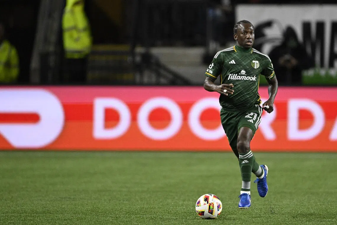 FILE PHOTO: Oct 23, 2024; Portland, Oregon, USA;  Portland Timbers midfielder Diego Chara (21) dribbles the ball during the first half against Vancouver Whitecaps FC at Providence Park. Mandatory Credit: Troy Wayrynen-Imagn Images/File Photo