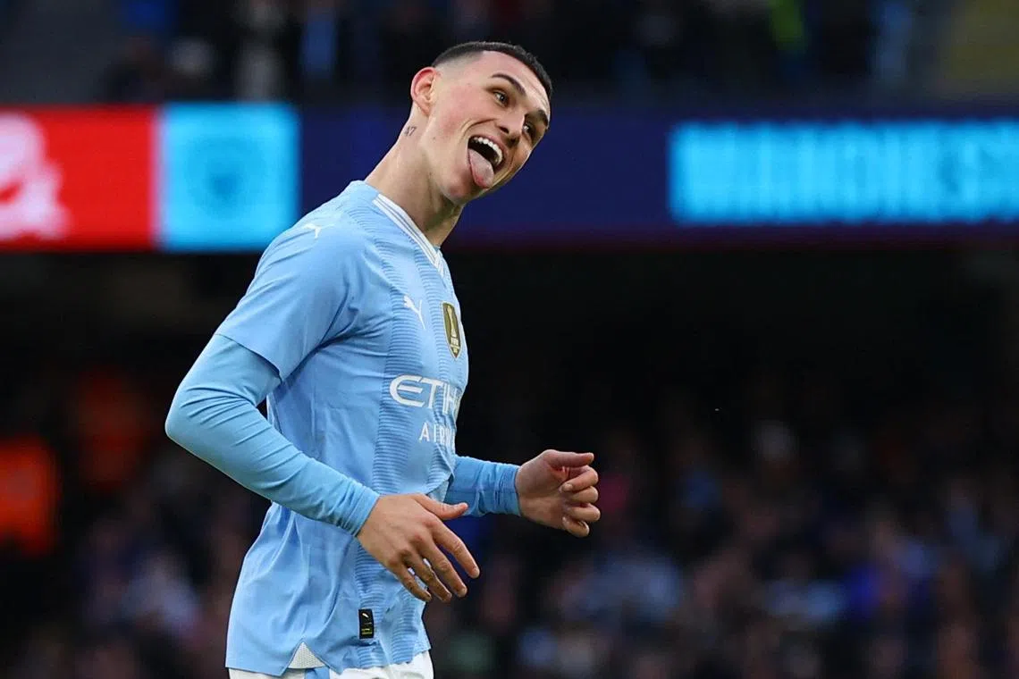 Manchester City's Phil Foden celebrates scoring his second goal in the 5-0 FA Cup third-round win over Huddersfield Town on Jan 7.