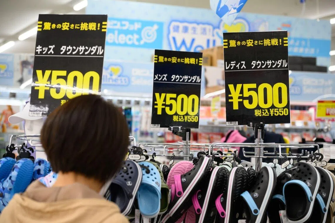 Price spikes have hit products reliant on rubber, plastic and oil-derived chemicals such as these footwear being sold at a store in Aichi prefecture, Japan.
