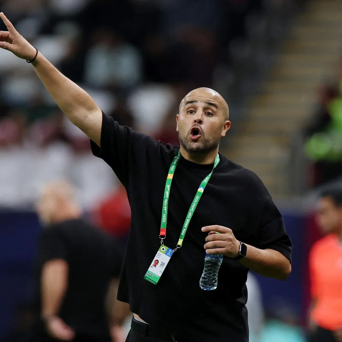 Soccer Football - FIFA Arab Cup - Qatar 2025 - Quarter Final - United Arab Emirates v Algeria - Al Bayt Stadium, Al Khor, Qatar - December 12, 2025 Algeria coach Madjid Bougherra reacts REUTERS/Ibraheem Al Omari