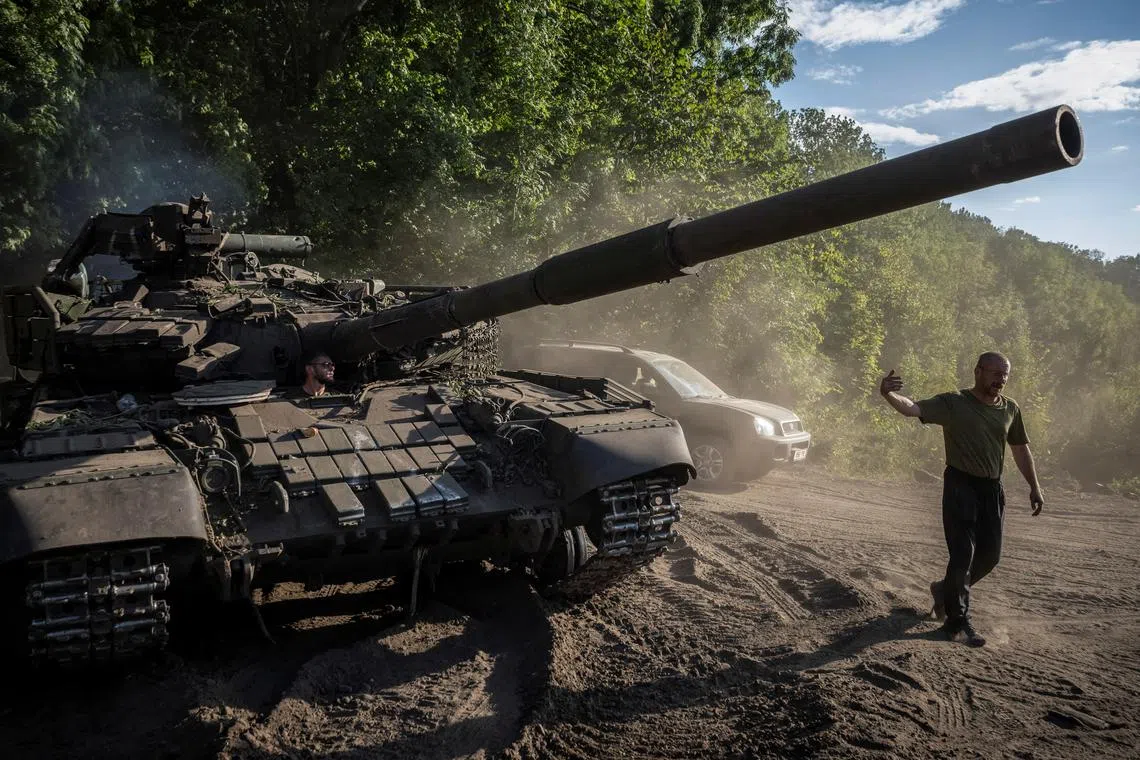 A Ukrainian serviceman operates a tank, amid Russia's attack on Ukraine, near the Russian border in Sumy region, Ukraine August 15, 2024. REUTERS/Viacheslav Ratynskyi/File Photo