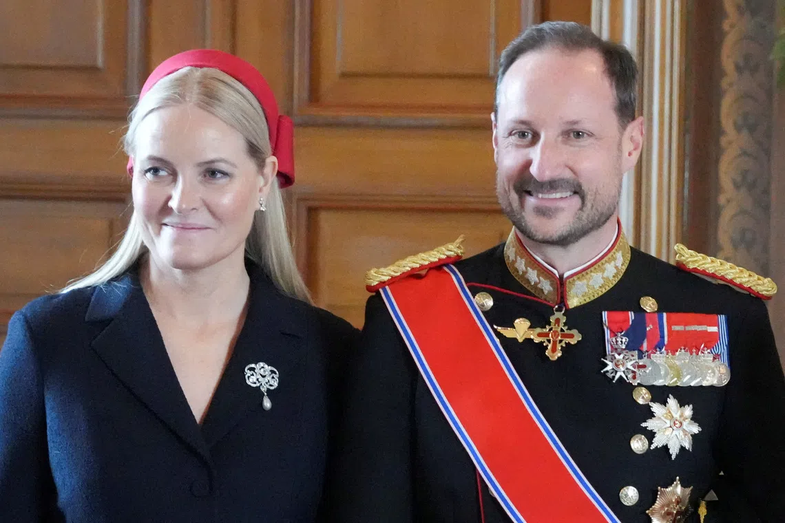 FILE PHOTO: Norway's Crown Prince Haakon and Crown Princess Mette-Marit pose for a photo in the Bird Room at the Royal Palace, in Oslo, Norway, March 24, 2026.  NTB/Ole Berg-Rusten via REUTERS   ATTENTION EDITORS - THIS IMAGE WAS PROVIDED BY A THIRD PARTY. NORWAY OUT. NO COMMERCIAL OR EDITORIAL SALES IN NORWAY./File Photo