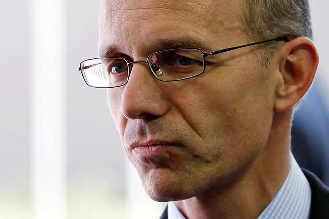 FILE PHOTO: Luxembourg's Finance Minister Luc Frieden talks to the media during a euro zone finance ministers meeting in Luxembourg June 20, 2013. Euro zone finance ministers will decide on Thursday when and how their bailout fund can invest in a bank to save it from failure, a long-promised move that aims to break a downward spiral between bad banks and their indebted home countries. REUTERS/Francois Lenoir/File Photo