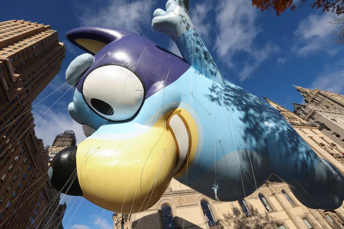 FILE PHOTO: Bluey balloon flies during the 97th Macy's Thanksgiving Day Parade in Manhattan, New York City, U.S., November 23, 2023. REUTERS/Mike Segar/File Photo
