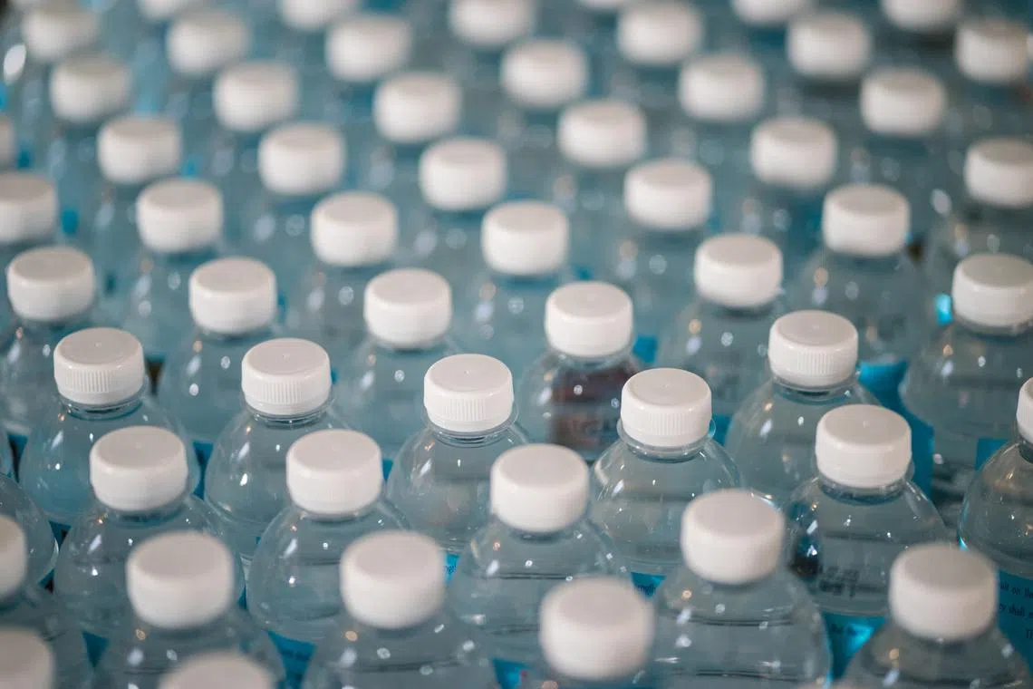 Assurances from city officials did little to quell a rush to buy bottled water. 