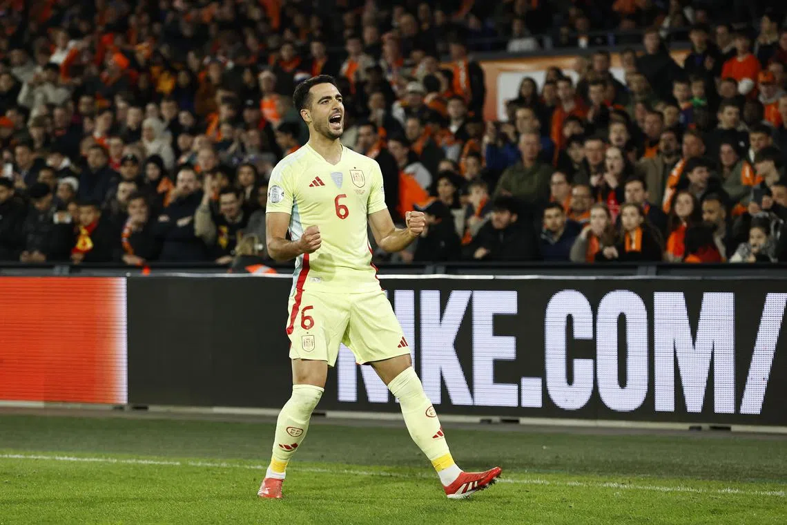 Mikel Merino of Spain celebrates after scoring a 93rd-minute equaliser in the 2-2 Nations League draw with the Netherlands.