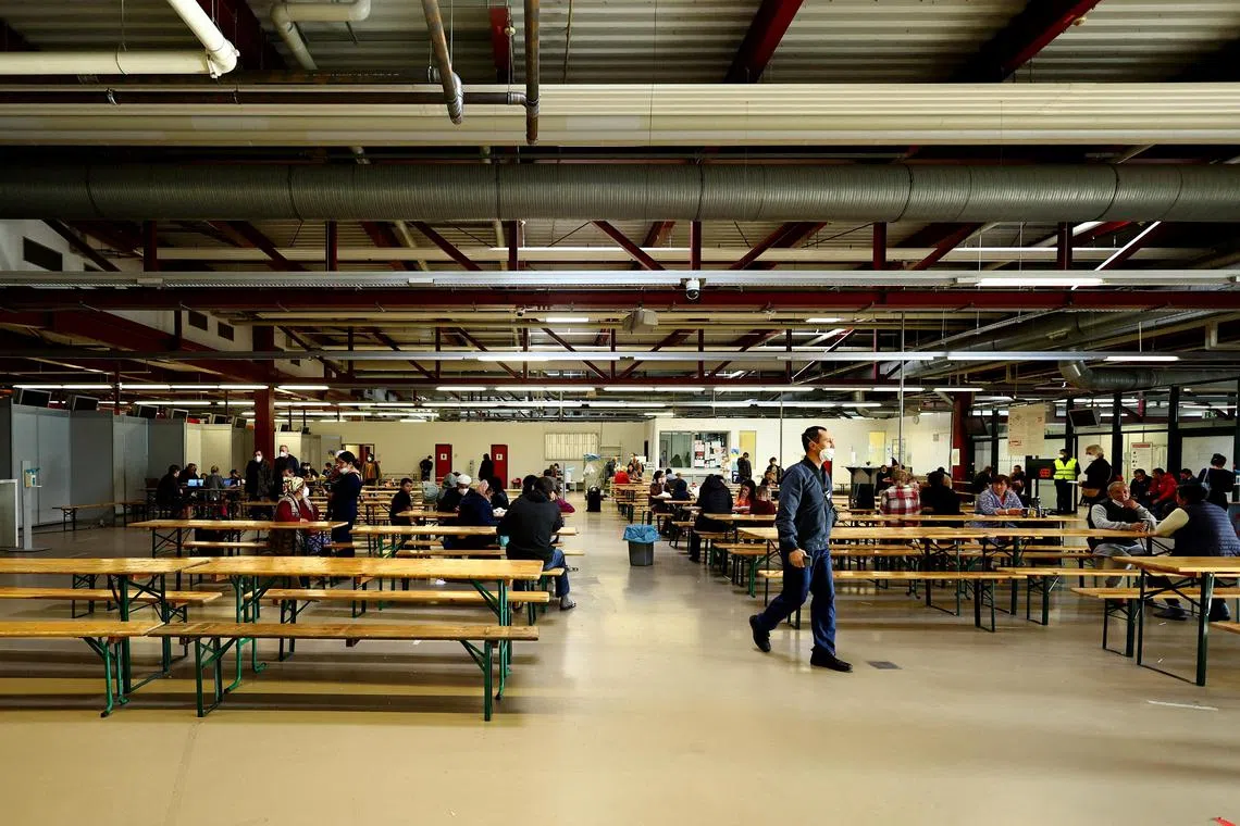 FILE PHOTO: A general view of a lunchroom in an accommodation centre for refugees, including Ukrainians, inside former airport Tegel in Berlin, Germany November 9, 2022. REUTERS/Lisi Niesner/File Photo