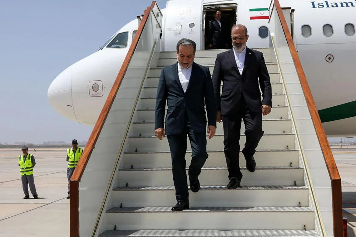 Iranian Foreign Minister Abbas Araghchi (left) arriving in Muscat in May for nuclear talks with the United States.