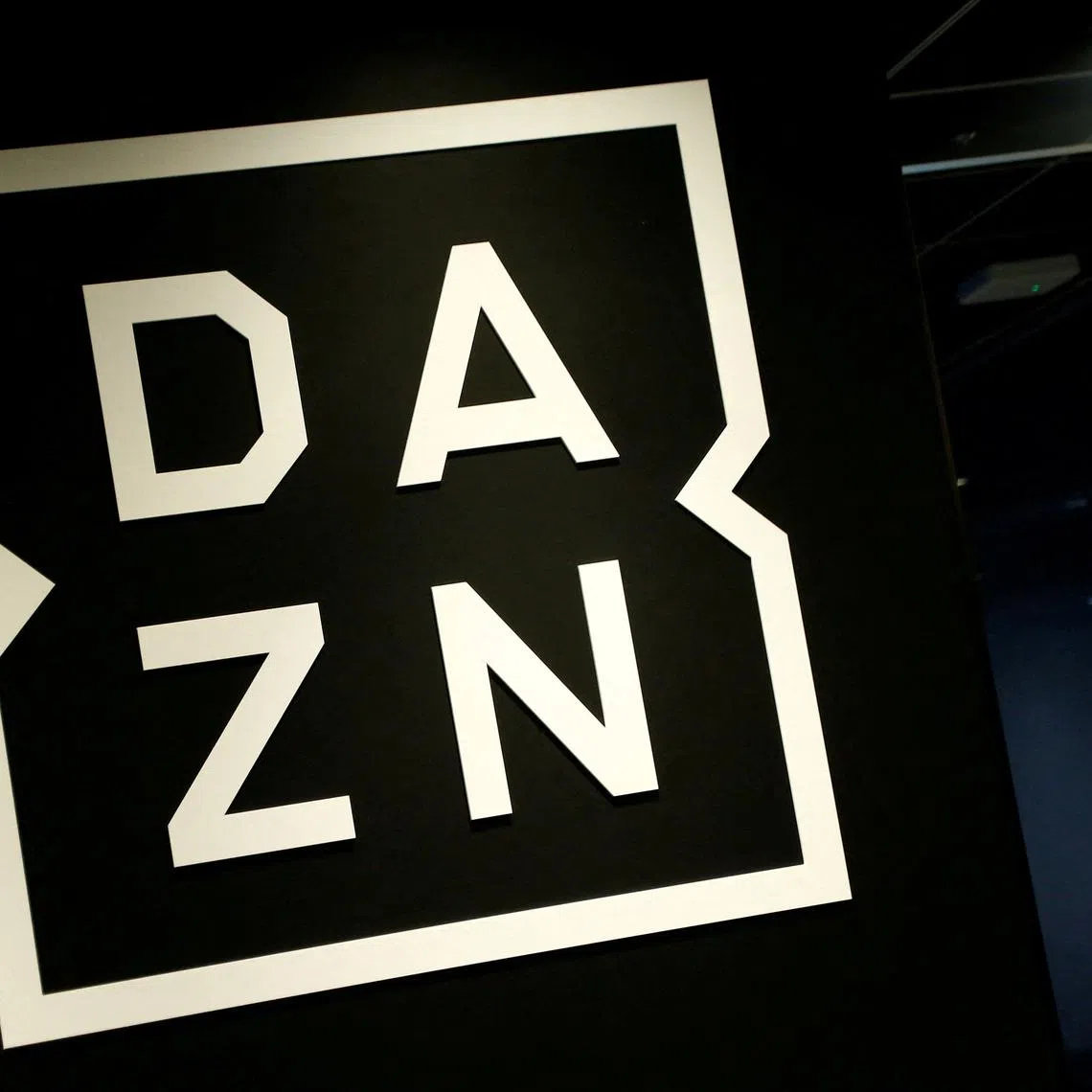 FILE PHOTO: Internet streaming service DAZN's logo is pictured in its office in Tokyo, Japan March 21, 2017. Picture taken on March 21, 2017. REUTERS/Kim Kyung-Hoon/File Photo