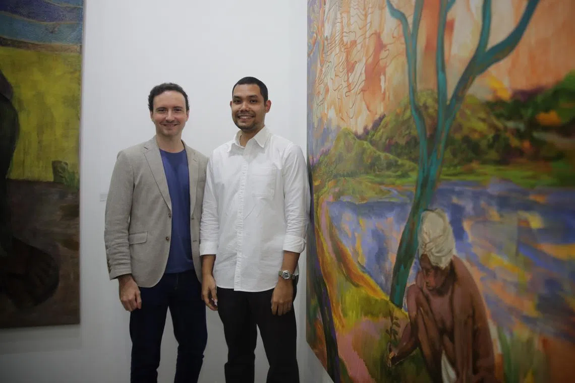 Gallerist Kevin Troyano Cuturi  (right) saw works by five artists including Khairulddin Wahab that Cuturi Gallery represents sell works at Art SG art fair.