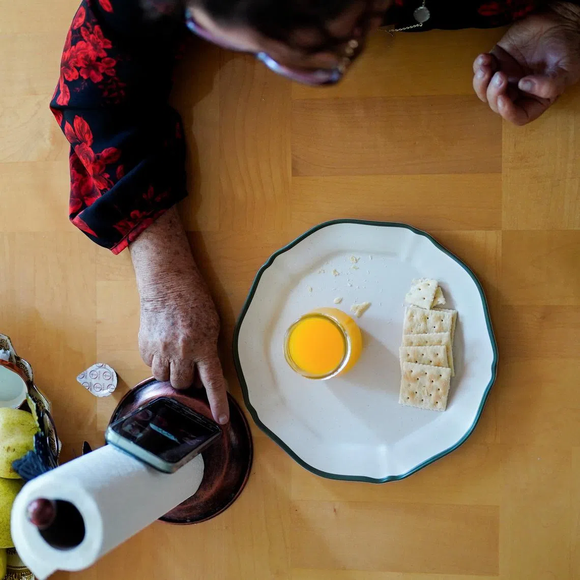 Doris Aguirre, an immigrant from Honduras, participates virtually in a Sunday service of the immigrant-focused Lincoln United Methodist Church, due to the threat of immigration sweeps, in Chicago, Illinois, U.S. August 31, 2025.  REUTERS/Audrey Richardson