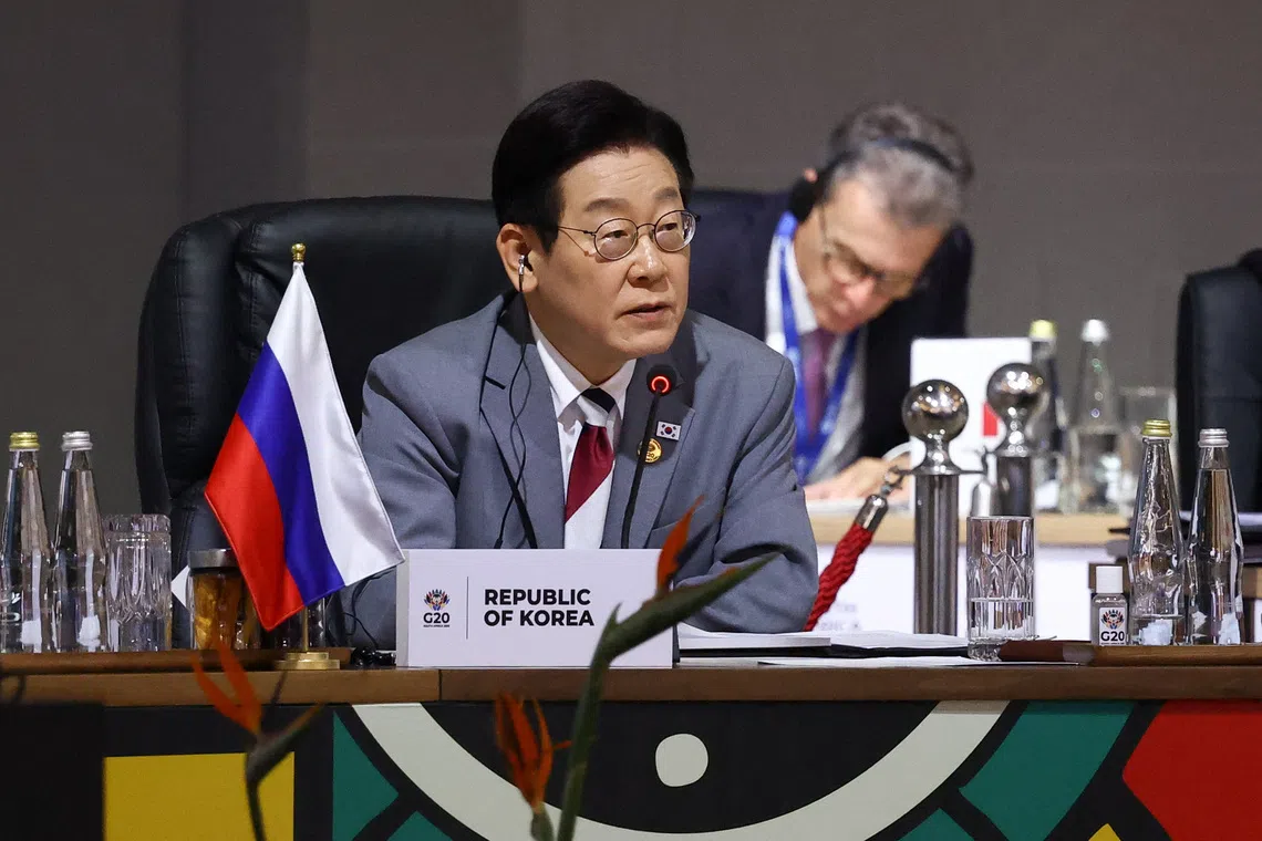 South Korea's President Lee Jae Myung attends a plenary session on the first day of the G20 Leaders' Summit at the Nasrec Expo Centre in Johannesburg, South Africa, November 22, 2025. REUTERS/Yves Herman