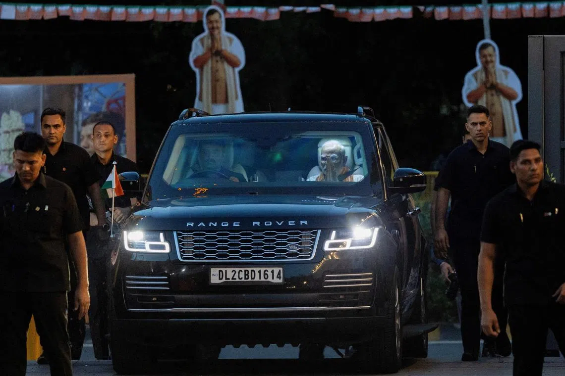 Indian Prime Minister Narendra Modi arriving at the ruling BJP's headquarters in New Delhi on May 4. He is known to have about a dozen vehicles in his motorcade.
