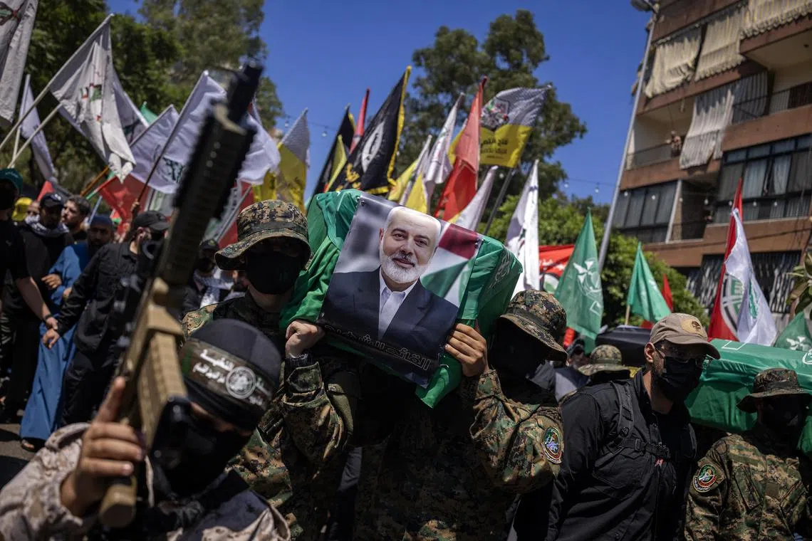 Hamas supporters parading with empty coffins in a symbolic funeral for Ismail Haniyeh, a top Hamas leader, in Beirut, Lebanon on Friday, Aug. 2, 2024. The assassinations of two Hamas leaders may be a short-term setback, analysts say, not enough to prevent the group from re-emerging intact — and possibly more radicalized. (Diego Ibarra Sanchez/The New York Times)
