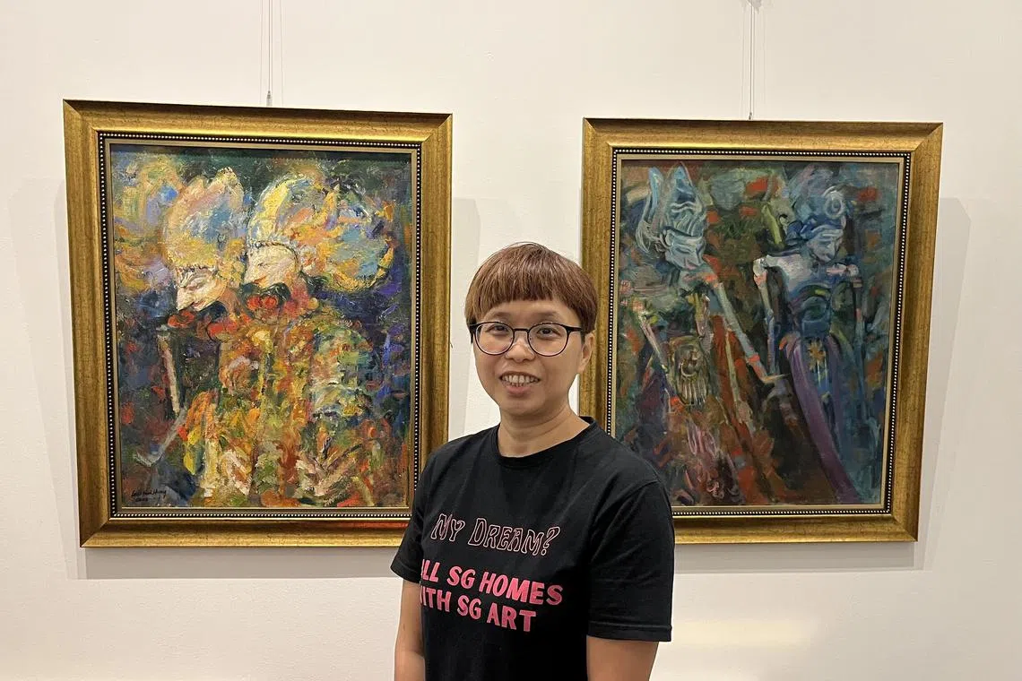 Low Sok Leng with two of the Low Hai Hong works available for fractional ownership. Wayang Kulit (No 11) (Left) has an estimated value of $33,000 to $35,000. Wayang Kulit (No 1) (Right) is worth $28,000 to $33,000.