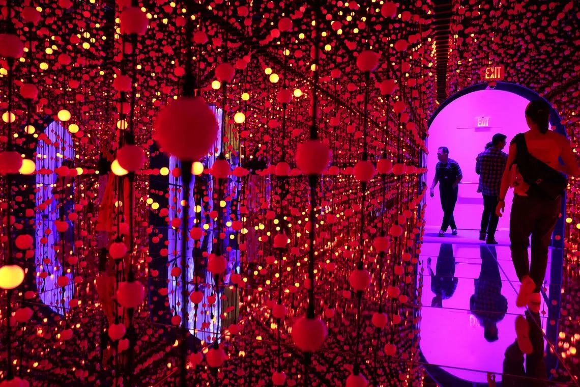 ST20240902_202468500569/pixbubble02/Brian Teo/ Members of the media exploring the Infinity Room during the 'Bubble Planet: An Immersive Experience' media preview at Singapore Expo on September 2, 2024. 

Bubble Planet, an LED wonderland where bubbles sparkle in a kaleidoscope of colors, invites visitors into a multisensory journey through 11 uniquely themed areas. From an enormous bubble bath ball pit to an undersea LED room and a soaring virtual reality experience, guests will be immersed in a dreamlike world filled with optical illusions and stunning visual displays. Suitable for all ages, the exhibition encourages visitors to release their inner child as they explore these fantastical landscapes.

After making its world premiere in Milan and touring major cities like the USA, Brussels, and London, 'Bubble Planet: An Immersive Experience' will be making its Asia-Pacific debut in Singapore on September 3 at Singapore Expo, Hall 8B. Tickets start at $21.90 for adults and $14.90 for children. Children under 4 can enter for free. 'Bubble Planet: An Immersive Experience' will be open from 11:00 am to 9:00pm from Mondays to Thursdays, 10:00am to 10:00pm on Friday and Saturday, and 10:00am to 9:00pm on Sunday. Visitors are encouraged to allow 60-90 minutes to fully enjoy each experience

ST PHOTO: BRIAN TEO 