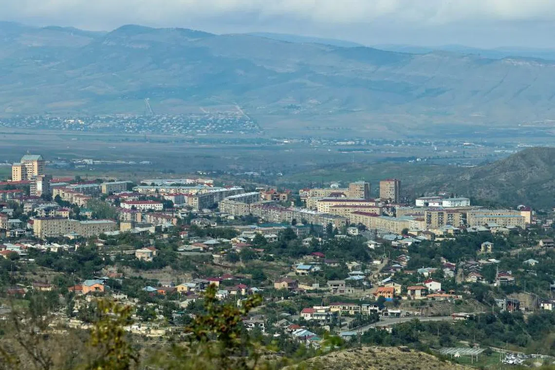 FILE PHOTO: A view shows Stepanakert city, known as Khankendi by Azerbaijan, following an Azeri military operation and a further mass exodus of ethnic Armenians from the region of Nagorno-Karabakh, October 2, 2023. REUTERS/Aziz Karimov/File Photo