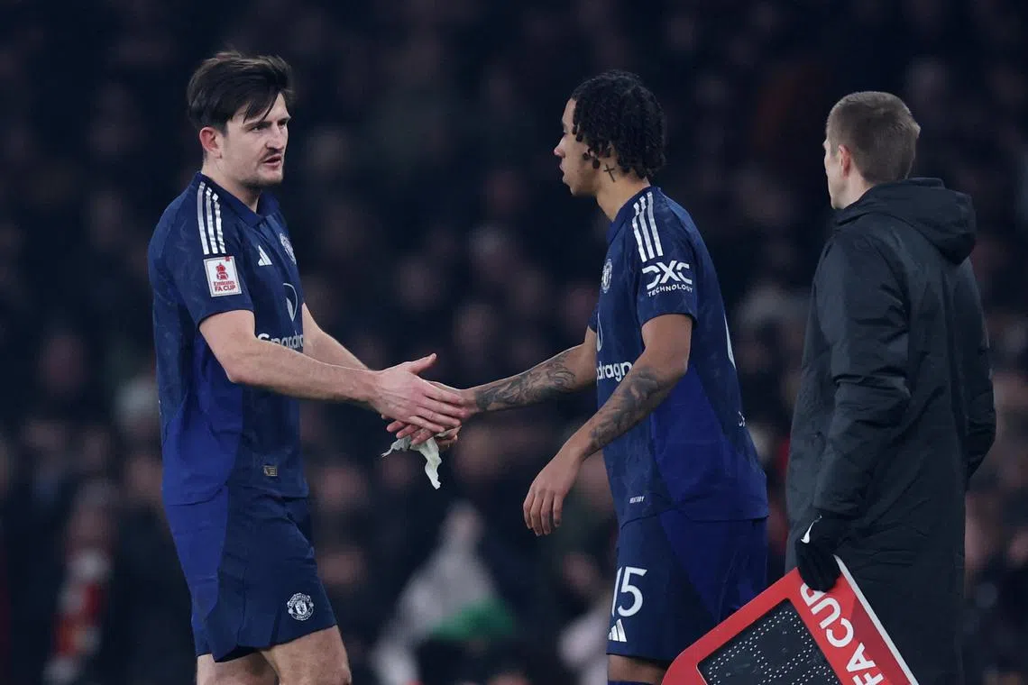 FILE PHOTO: Soccer Football - FA Cup - Third Round - Arsenal v Manchester United - Emirates Stadium, London, Britain - January 12, 2025 Manchester United's Leny Yoro comes on as a substitute to replace Harry Maguire REUTERS/David Klein/File Photo