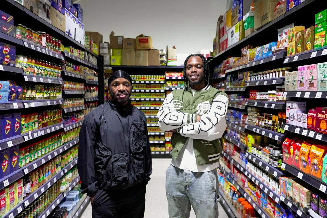 British rappers Krept and Konan stand in their new supermarket called Saveways that caters to ethnic minorities in Croydon, Britain, January 30, 2025. REUTERS/Marissa Davison