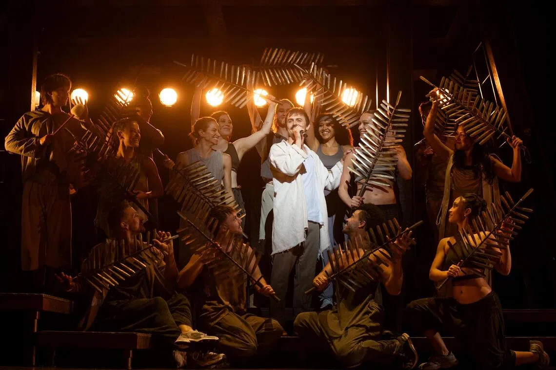 British actor Luke Street (centre, in white) playing the role of Jesus in the musical Jesus Christ Superstar.