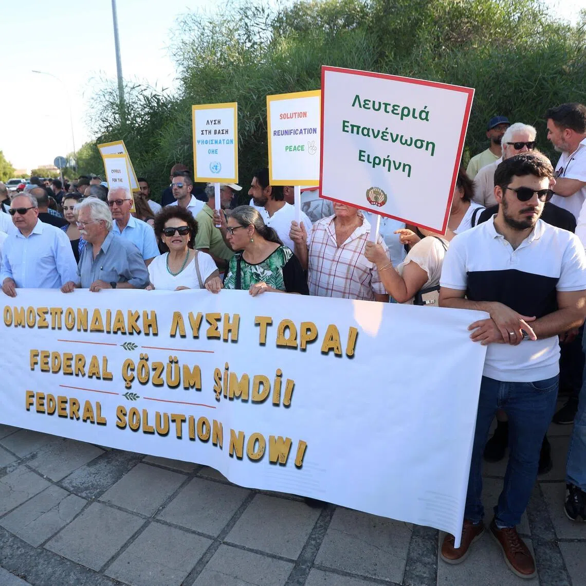 Protesters at a rally organised by the bicommunal initiative “United Cyprus” near the UN Buffer Zone in Nicosia, Cyprus, July 28.