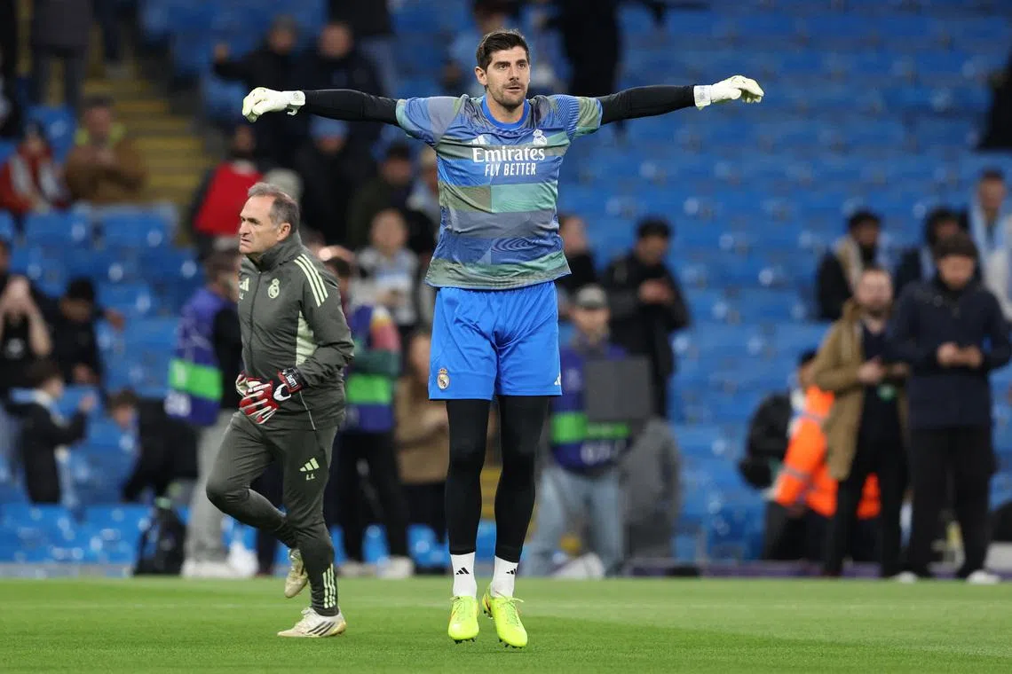 FILE PHOTO: Soccer Football - UEFA Champions League - Round 16 - Second Leg - Manchester City v Real Madrid - Etihad Stadium, Manchester, Britain - March 17, 2026 Real Madrid's Thibaut Courtois during the warm up before the match REUTERS/Scott Heppell/File Photo