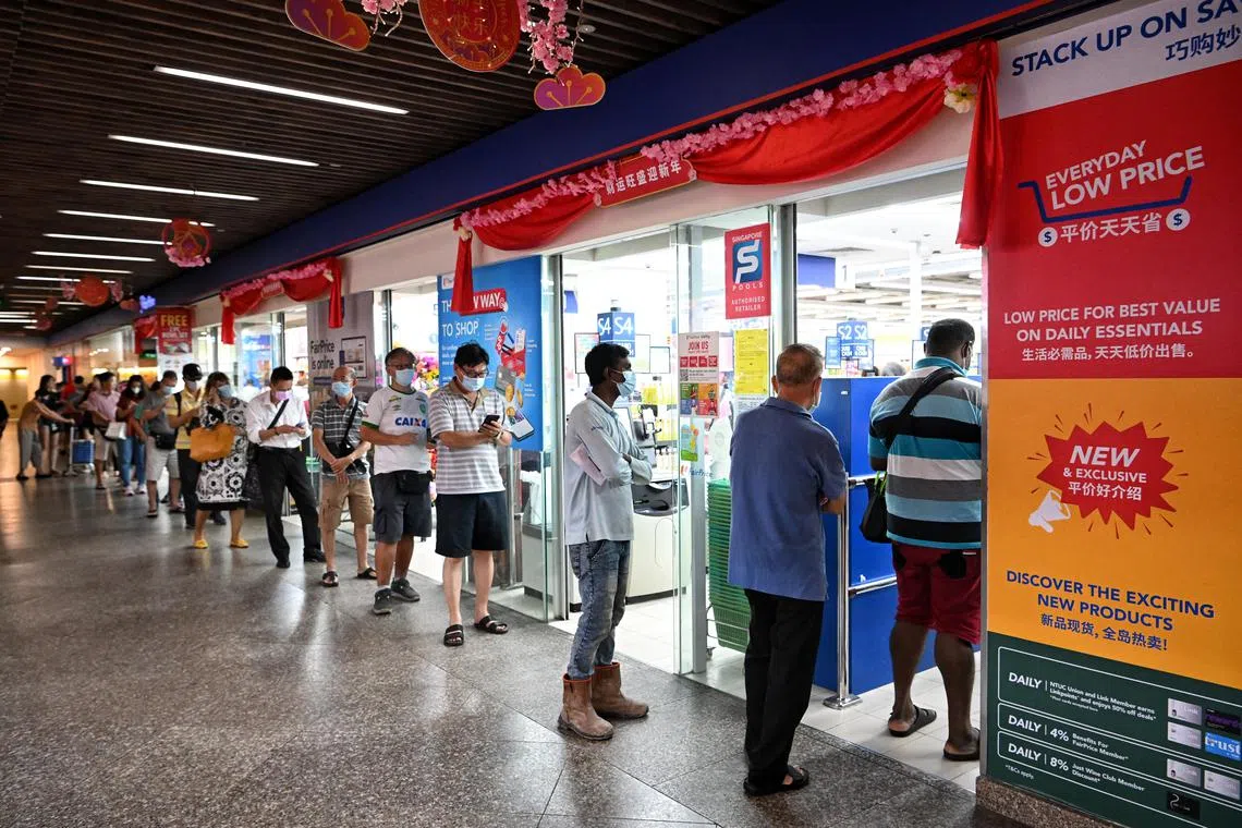 ST20230203_202390918418 Kua Chee Siong/ jttoto03/ A queue forms on the last day to place bets for the TOTO Hong Bao Draw 2023, at the Singapore Pool Outlet at the Toa Payoh HDB Centre on Feb 3, 2023.