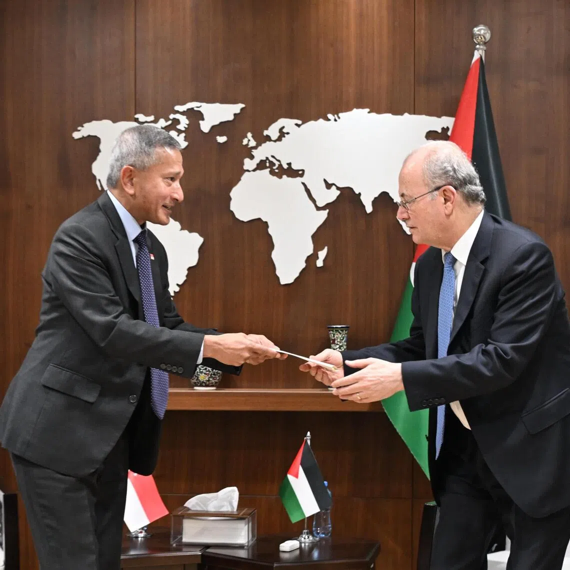 Minister of Foreign Affairs Dr Vivian Balakrishnan handing over a formal invitation for the Palestinian Prime Minister Mohammad Mustafa to visit Singapore on Nov 4, 2025.