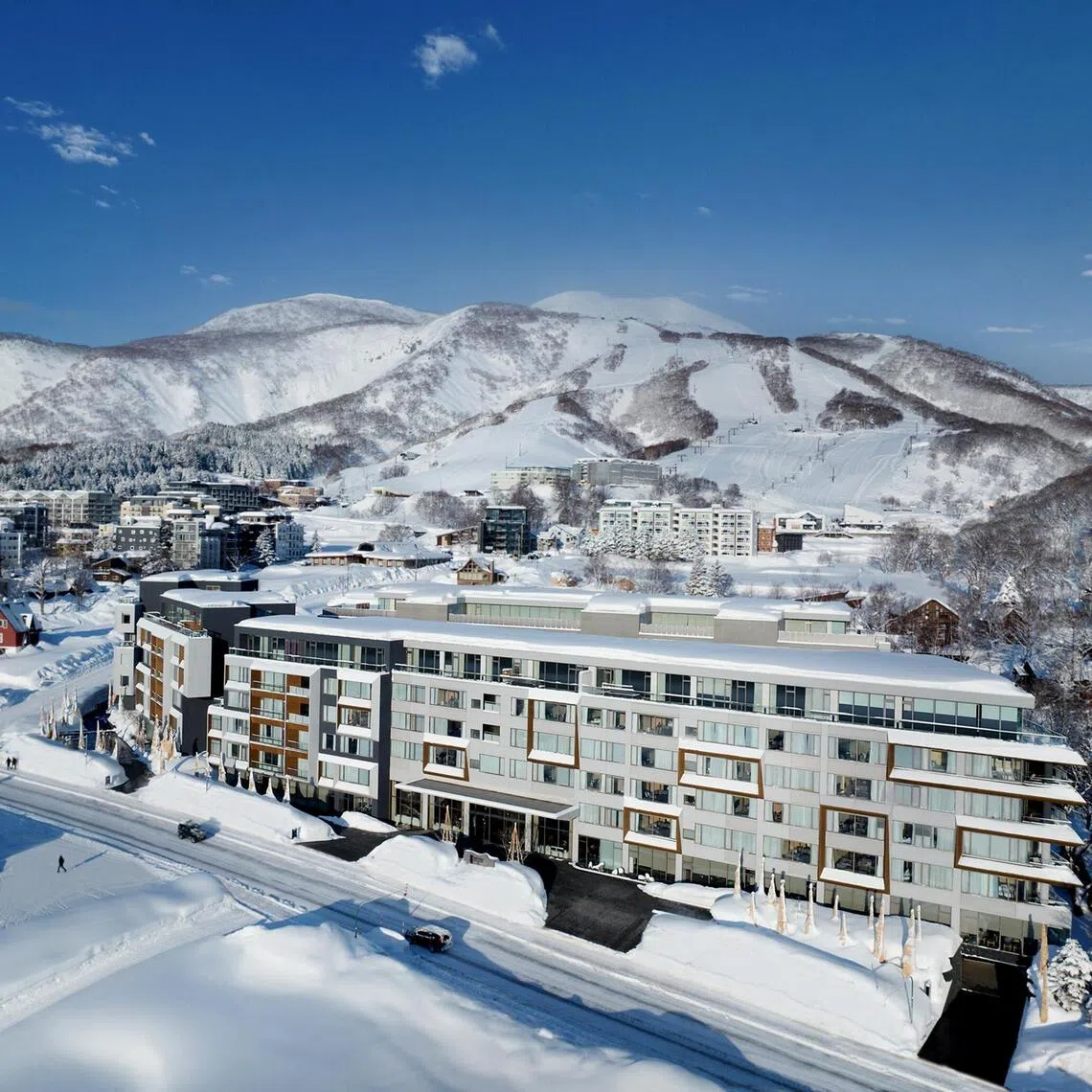 In the winter, Setsu Niseko offers expansive views of snow-covered mountains and ski slopes.