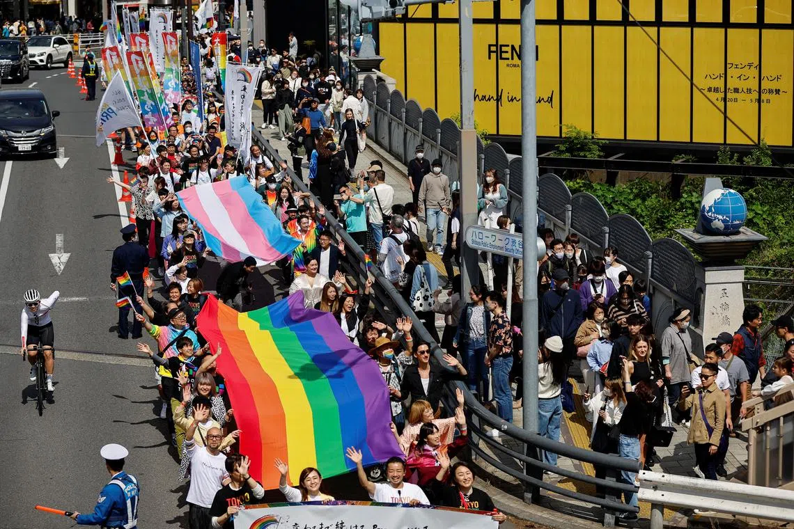 FILE PHOTO: Participants march during the Tokyo Rainbow Pride parade, celebrating advances in LGBTQ rights and calling for marriage equality, in Tokyo, Japan, April 23, 2023. REUTERS/Issei Kato/File Photo